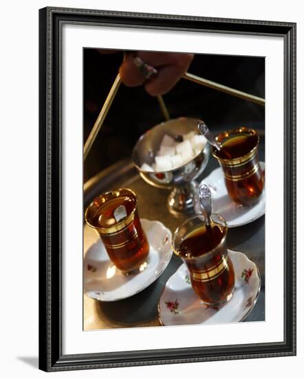 Hand Holding a Tray with Turkish Tea, Istanbul, Turkey, Europe-Levy Yadid-Framed Photographic Print