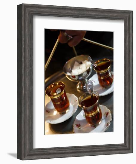 Hand Holding a Tray with Turkish Tea, Istanbul, Turkey, Europe-Levy Yadid-Framed Photographic Print