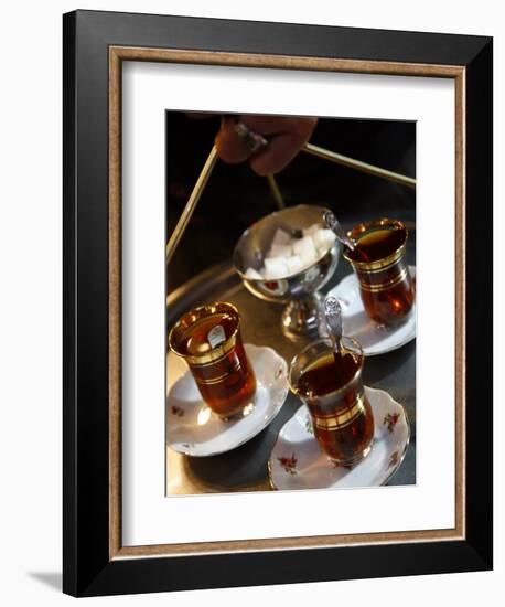 Hand Holding a Tray with Turkish Tea, Istanbul, Turkey, Europe-Levy Yadid-Framed Photographic Print