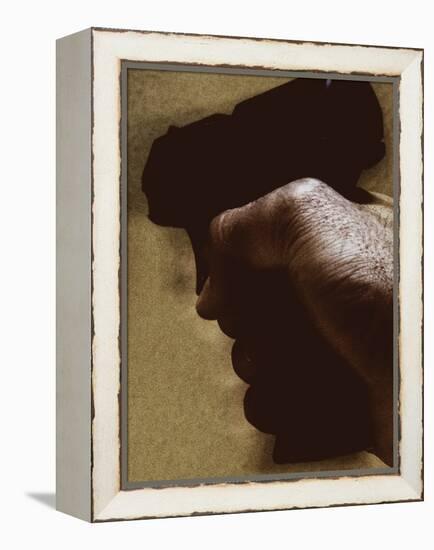 Hand Holding Gun-Torsten Richter-Framed Premier Image Canvas