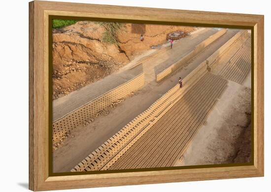 Hand Made Bricks Laid Out on the Ground to Dry before Baking, Northeast of Jaipur, Rajasthan, India-Annie Owen-Framed Premier Image Canvas