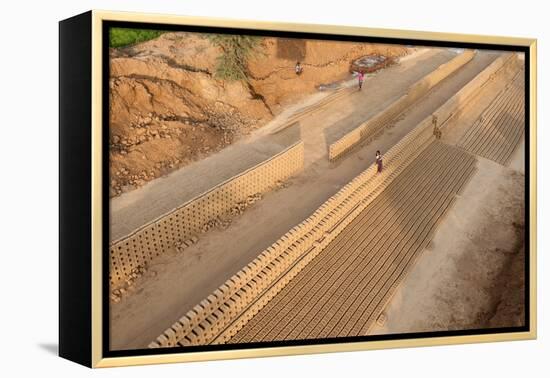 Hand Made Bricks Laid Out on the Ground to Dry before Baking, Northeast of Jaipur, Rajasthan, India-Annie Owen-Framed Premier Image Canvas