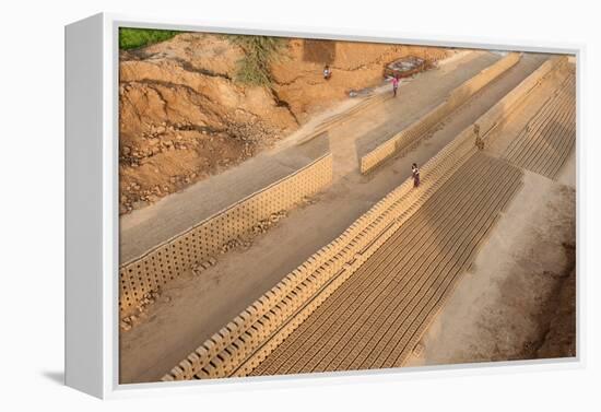 Hand Made Bricks Laid Out on the Ground to Dry before Baking, Northeast of Jaipur, Rajasthan, India-Annie Owen-Framed Premier Image Canvas