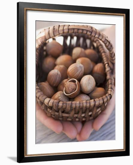 Hands Holding Basket of Hazelnuts-null-Framed Photographic Print