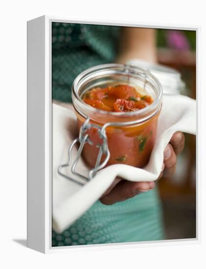 Hands Holding Preserving Jar of Tomato Sauce-null-Framed Premier Image Canvas