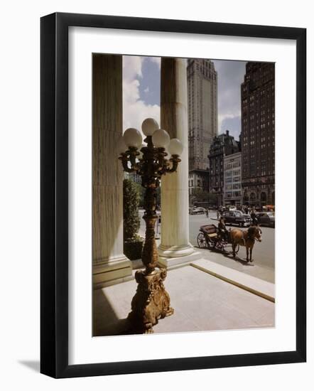 Handsome Cab Horse Drawn Carriage Waiting Outside Entrance of the Plaza Hotel-Dmitri Kessel-Framed Photographic Print