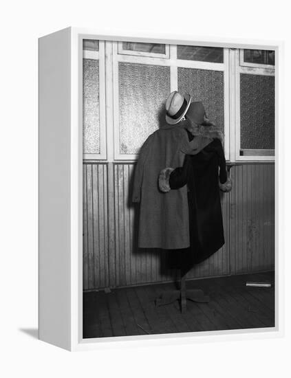 Hanging Coats Posed as an Embracing Couple-Bettmann-Framed Premier Image Canvas