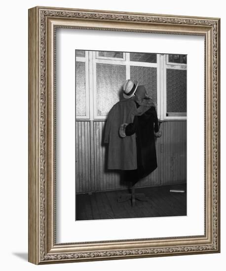 Hanging Coats Posed as an Embracing Couple-Bettmann-Framed Premium Photographic Print