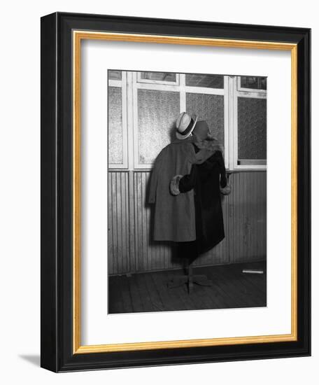 Hanging Coats Posed as an Embracing Couple-Bettmann-Framed Premium Photographic Print