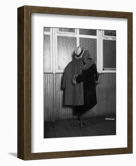 Hanging Coats Posed as an Embracing Couple-Bettmann-Framed Photographic Print