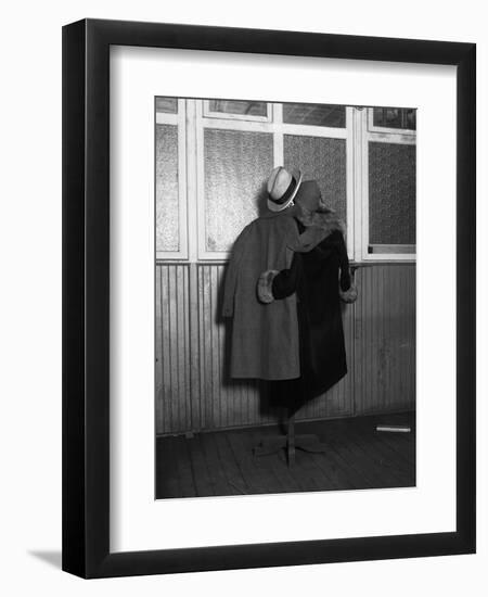 Hanging Coats Posed as an Embracing Couple-Bettmann-Framed Photographic Print