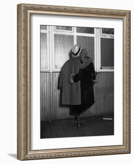 Hanging Coats Posed as an Embracing Couple-Bettmann-Framed Photographic Print