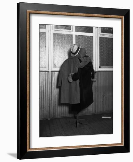 Hanging Coats Posed as an Embracing Couple-Bettmann-Framed Photographic Print