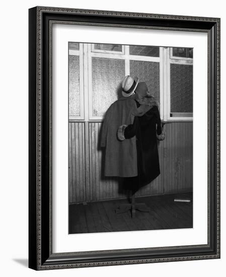 Hanging Coats Posed as an Embracing Couple-Bettmann-Framed Photographic Print