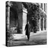 Scholar C.S. Lewis Walking with Cane Near Building at Magdalen College, Oxford University-Hans Wild-Premier Image Canvas