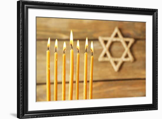 Hanukkah Candle on Wooden Background-Yastremska-Framed Photographic Print