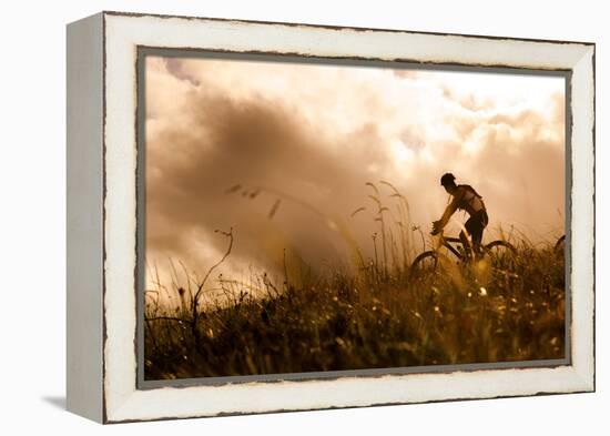 Happy Couple Riding Bicycles Outside, Healthy Lifestyle Fun Concept. Silhouette at Sunset Panoramic-warrengoldswain-Framed Premier Image Canvas