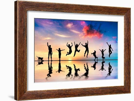 Happy Group Of Friends, Family With Dog And Cat Jumping Together At Sunset, Water Reflection-Michal Bednarek-Framed Art Print