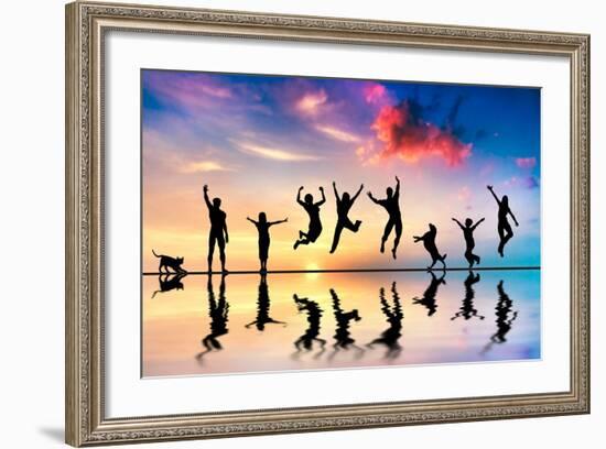 Happy Group Of Friends, Family With Dog And Cat Jumping Together At Sunset, Water Reflection-Michal Bednarek-Framed Art Print