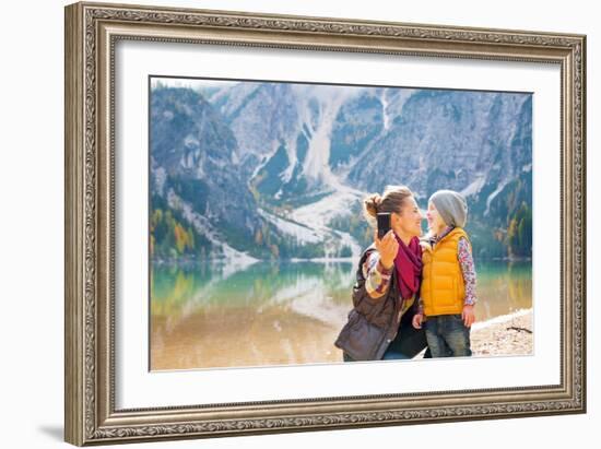 Happy Mother and Baby Making Selfie on Lake Braies in South Tyrol, Italy-Mr Alliance-Framed Photographic Print