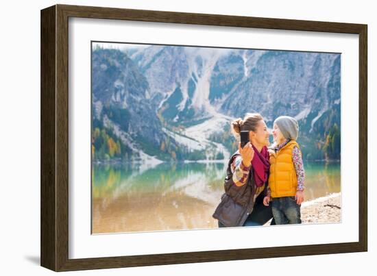 Happy Mother and Baby Making Selfie on Lake Braies in South Tyrol, Italy-Mr Alliance-Framed Photographic Print