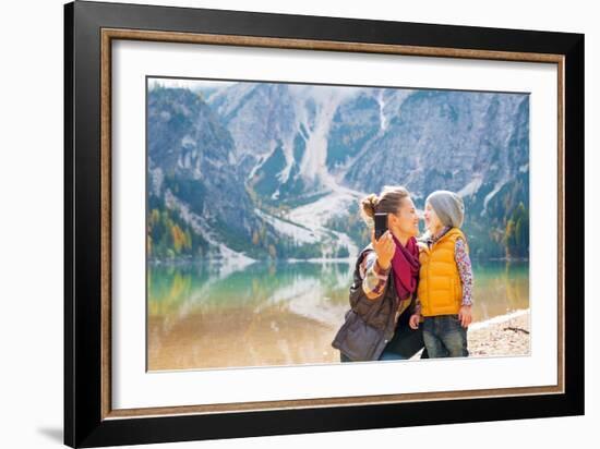 Happy Mother and Baby Making Selfie on Lake Braies in South Tyrol, Italy-Mr Alliance-Framed Photographic Print