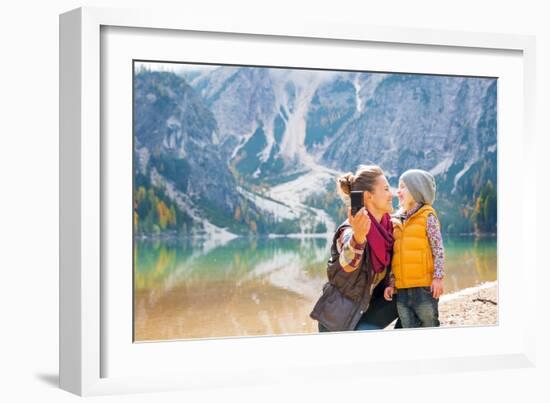 Happy Mother and Baby Making Selfie on Lake Braies in South Tyrol, Italy-Mr Alliance-Framed Photographic Print