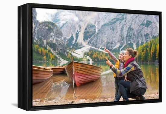 Happy Mother and Baby Pointing on Copy Space While on Lake Braies in South Tyrol, Italy-Mr Alliance-Framed Premier Image Canvas