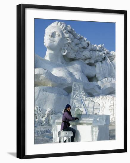 Harbin City, A Tourist Is Playing a Sculpted Ice Piano, Snow and Ice Festival, China-Christian Kober-Framed Photographic Print