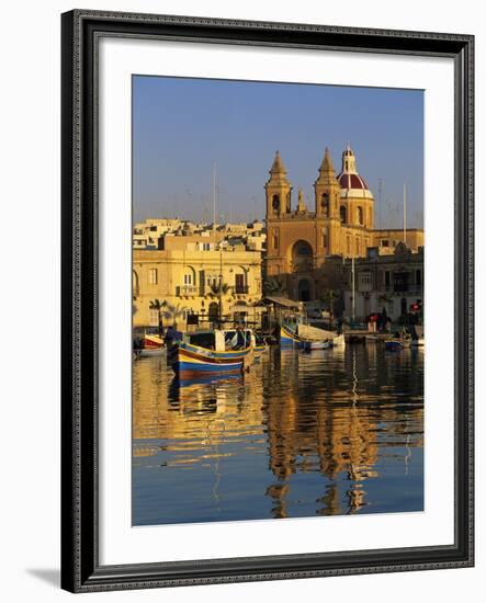 Harbour with Luzzu Fishing Boats and Marsaxlokk Parish Church at Sunrise, Marsaxlokk, Malta, Medite-Stuart Black-Framed Photographic Print