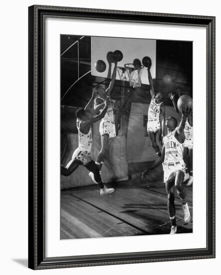 Harlem Globetrotters Playing in a Basketball Game-J^ R^ Eyerman-Framed Premium Photographic Print