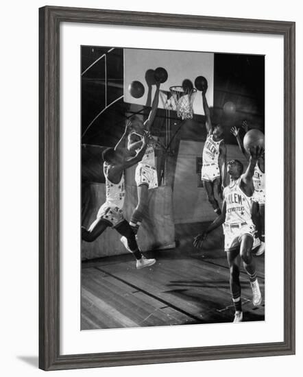 Harlem Globetrotters Playing in a Basketball Game-J^ R^ Eyerman-Framed Premium Photographic Print