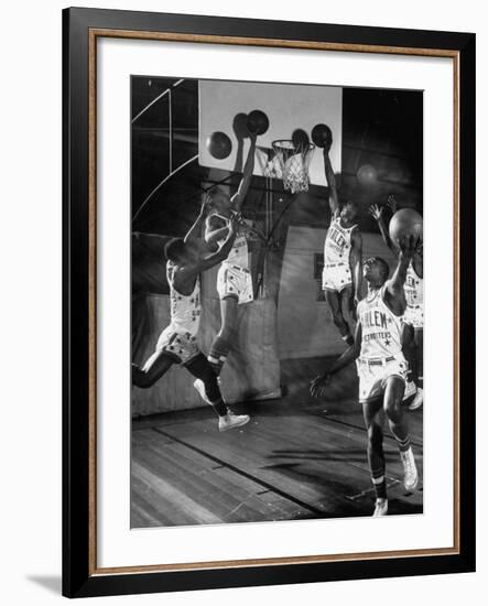 Harlem Globetrotters Playing in a Basketball Game-J^ R^ Eyerman-Framed Premium Photographic Print