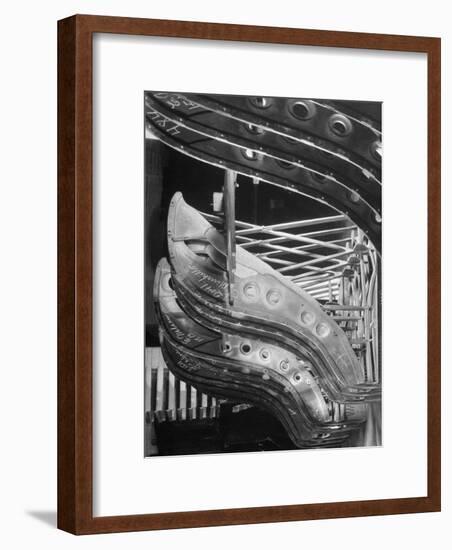 Harp-Shaped Steel String Frames in Racks Waiting to be Installed at the Steinway Piano Factory-Margaret Bourke-White-Framed Premium Photographic Print