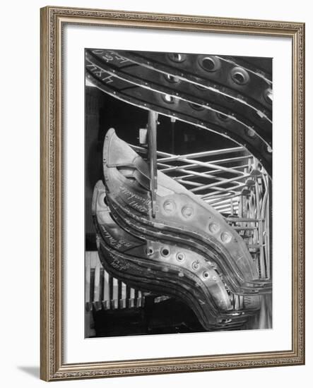 Harp-Shaped Steel String Frames in Racks Waiting to be Installed at the Steinway Piano Factory-Margaret Bourke-White-Framed Premium Photographic Print