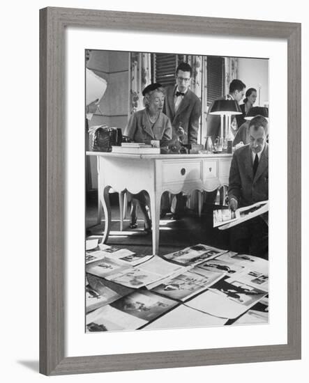 Harper's Bazaar Editor Carmel Snow Examining Some Layouts with Alevey Brodovitch, in Her Office-Walter Sanders-Framed Premium Photographic Print