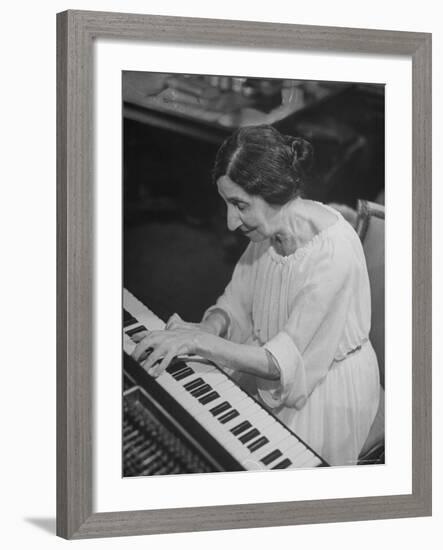 Harpsichordist Wanda Landowska, at Home Playing the Harpsichord-Herbert Gehr-Framed Premium Photographic Print