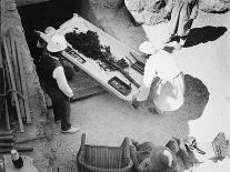 Howard Carter and a colleague excavating a tomb in the Valley of the Kings, Egypt, 1922-Harry Burton-Photographic Print