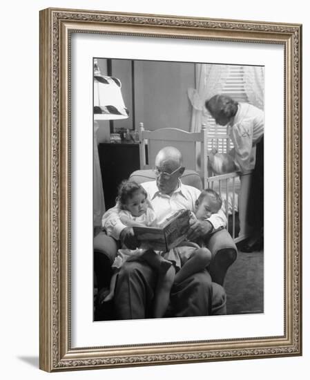 Harry Frantz Reading His Grandchildren to Sleep-Nina Leen-Framed Photographic Print