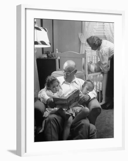 Harry Frantz Reading His Grandchildren to Sleep-Nina Leen-Framed Photographic Print