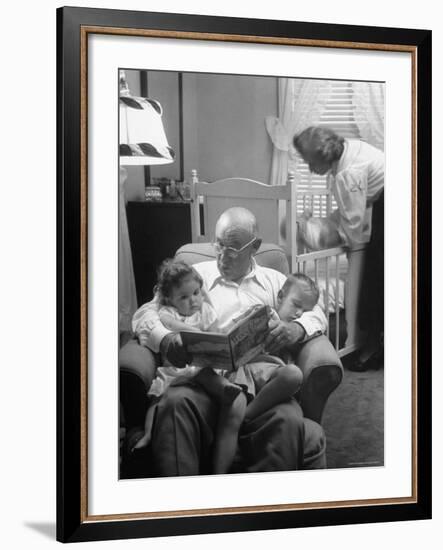 Harry Frantz Reading His Grandchildren to Sleep-Nina Leen-Framed Photographic Print