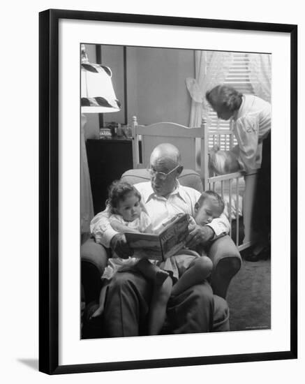 Harry Frantz Reading His Grandchildren to Sleep-Nina Leen-Framed Photographic Print