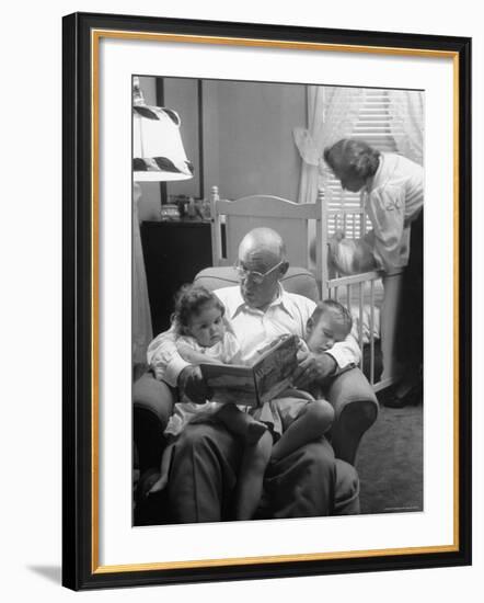 Harry Frantz Reading His Grandchildren to Sleep-Nina Leen-Framed Photographic Print