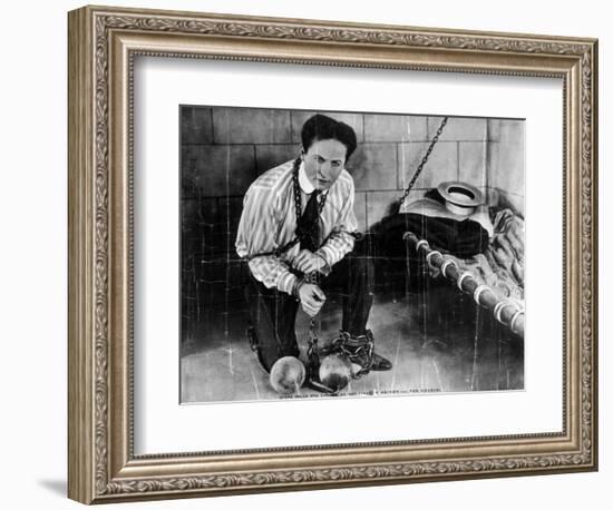 Harry Houdini About to Escape from Prison Photograph-Lantern Press-Framed Art Print