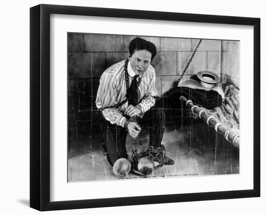 Harry Houdini About to Escape from Prison Photograph-Lantern Press-Framed Art Print