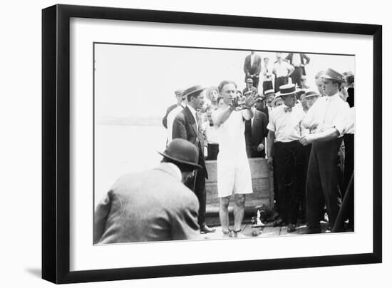 Harry Houdini being handcuffed before being nailed into a crate and lowered into New York Bay, 1912-George Grantham Bain-Framed Photographic Print