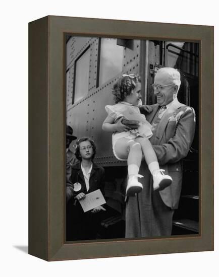 Harry Truman Holding up 3 Yr Old Suzanne Bump after the Town's Postmaster Pressed Her into Service-Hank Walker-Framed Premier Image Canvas