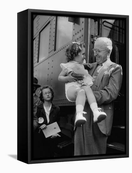 Harry Truman Holding up 3 Yr Old Suzanne Bump after the Town's Postmaster Pressed Her into Service-Hank Walker-Framed Premier Image Canvas