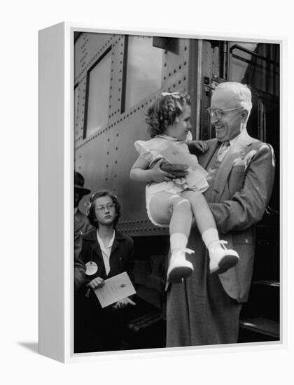 Harry Truman Holding up 3 Yr Old Suzanne Bump after the Town's Postmaster Pressed Her into Service-Hank Walker-Framed Premier Image Canvas