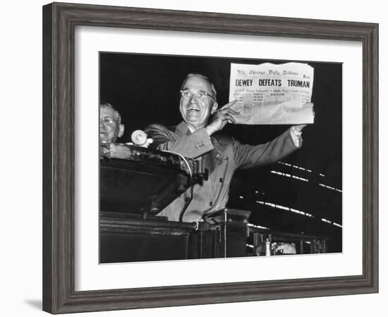 Harry Truman Jubilantly Displaying Erroneous Chicago Daily Tribune Headline "Dewey Defeats Truman"-W^ Eugene Smith-Framed Photographic Print